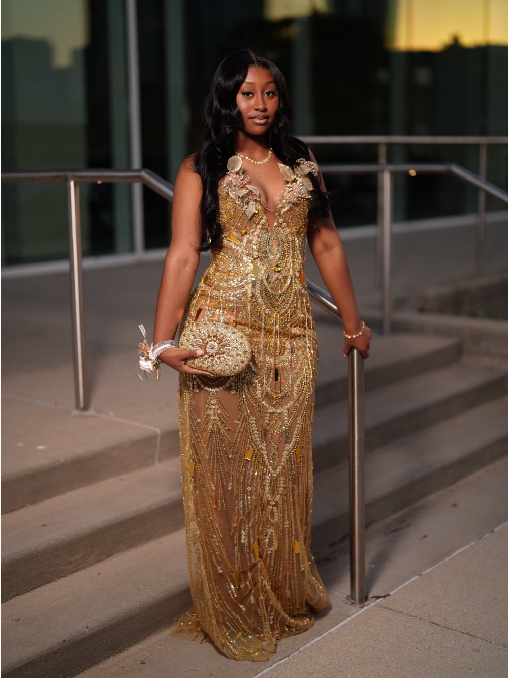 A fully beaded prom dress with a corset in the back.